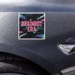 Brainrot Era car magnet: A square magnet with a glitch art design in teal and pink, featuring the text "BRAINROT ERA" for a unique, Gen Z aesthetic.