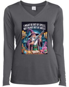 A woman models an iron grey long-sleeved V-neck tee featuring a wizard holding a shotgun amidst potions and spellbooks. The shirt reads: "I might be out of spells, but I'm not out of shells." A fun D&D gamer shirt.