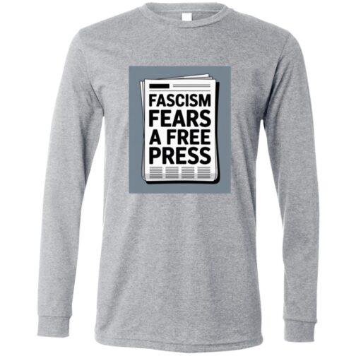 Heather gray long-sleeve tee featuring a newspaper graphic with the text "Fascism Fears A Free Press," promoting activist apparel.