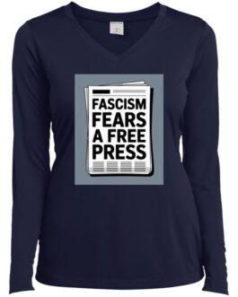 A navy blue women's long-sleeve v-neck tee shirt features a graphic of a newspaper with the text "Fascism Fears A Free Press." Activist apparel.