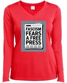Hot coral women's V-neck long sleeve tee with a graphic of a newspaper that reads "Fascism Fears A Free Press," promoting activist apparel.