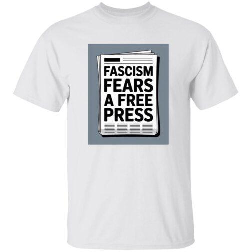 White t-shirt featuring a graphic of a newspaper with the text "Fascism Fears A Free Press." Activist apparel promoting freedom of the press.