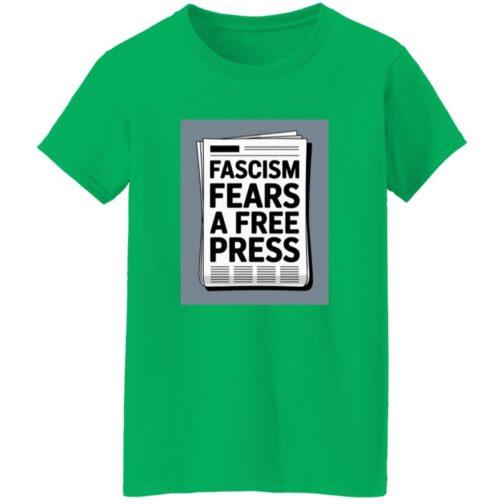 A green women's classic fit cotton tee, size small, with a graphic of a newspaper headline that reads "Fascism Fears A Free Press." This activist t-shirt promotes freedom of the press.