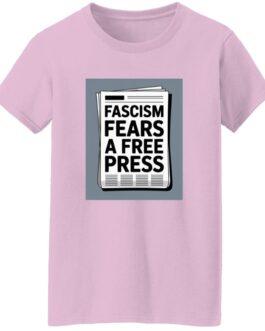 Light pink "Fascism Fears A Free Press" activist T-shirt. The design features a newspaper graphic with bold text highlighting the importance of a free press in resisting fascism. A classic fit women's tee in size S.