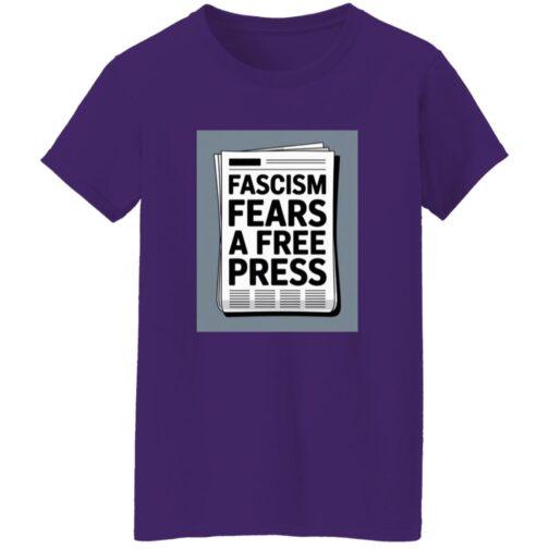 Purple t-shirt featuring a newspaper graphic with the text "Fascism Fears A Free Press." An activist t-shirt promoting freedom of the press.