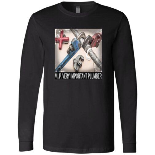 Black V.I.P. Very Important Plumber long sleeve tee shirt. The design shows a close-up of pipes being worked on with wrenches. A red cross is visible in the background.