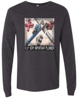 Dark grey long sleeve tee featuring a square graphic of crossed plumbing pipes and wrenches. The graphic includes the text "V.I.P. VERY IMPORTANT PLUMBER.