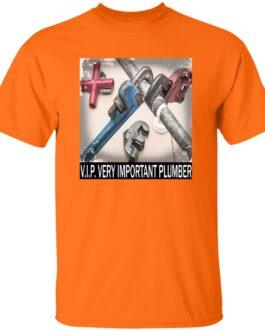 An orange V.I.P. Very Important Plumber T-shirt with a graphic of assorted pipe wrenches and a pipe fitting, tools commonly used by plumbers.
