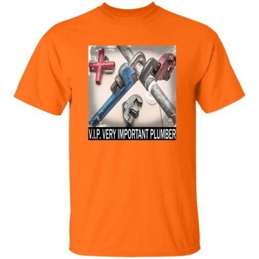 An orange V.I.P. Very Important Plumber T-shirt with a graphic of assorted pipe wrenches and a pipe fitting, tools commonly used by plumbers.