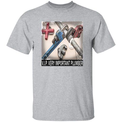 V.I.P. Very Important Plumber T-shirt in sport grey, featuring an image of plumbing tools and pipes, including pipe wrenches, arranged on a white surface with the text "V.I.P. VERY IMPORTANT PLUMBER.