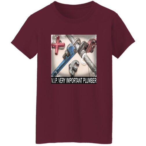 Maroon women's V.I.P. Plumber t-shirt featuring a graphic of plumbing wrenches and pipes. The text reads "V.I.P. Very Important Plumber.