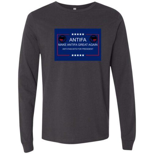Dark grey long sleeve tee with a political graphic. The graphic has "ANTIFA MAKE ANTIFA GREAT AGAIN ANTI-FASCISTS FOR PRESIDENT" text and Antifa symbols inside a blue and red frame.