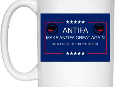 White 15oz ceramic "Make Antifa Great Again" mug. Features the Antifa logo, stars, and red frame on a blue background. A unique political gift for social justice advocates.