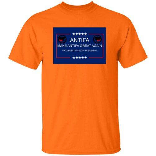 Safety orange t-shirt featuring a blue rectangle graphic with "ANTIFFA" in white text, "MAKE ANTIFFA GREAT AGAIN" and "ANTI-FASCISTS FOR PRESIDENT" below, flanked by Antifa flag symbols. A protest tee.
