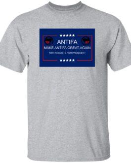 A sport grey t-shirt displays a blue graphic with "Antifa: Make Antifa Great Again" in white text. The design includes the Antifa flag symbols and stars. "Anti-Fascists for President" is also featured.