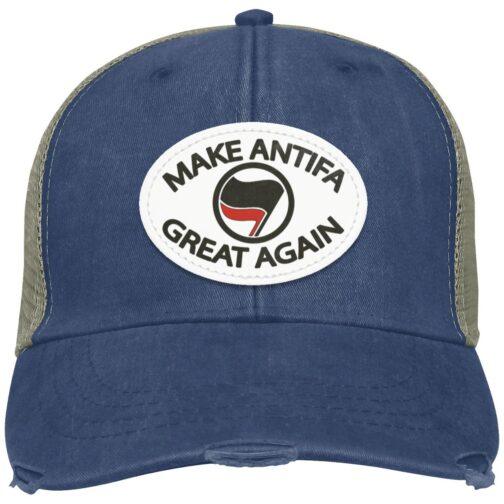 A navy blue "Make Antifa Great Again" hat. This distressed Adams trucker cap features a vegan leather oval patch with the Antifa flag. A stylish piece of anti-fascist apparel.