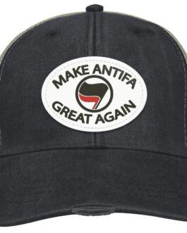 Distressed black trucker cap with a vegan leather patch reading "Make Antifa Great Again" around an Antifa flag symbol. Anti-fascist apparel detail.