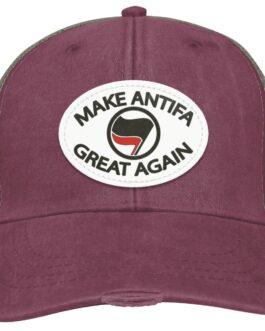 Maroon "Make Antifa Great Again" hat. This distressed Adams trucker cap features a vegan leather patch with the slogan and anti-fascist flag symbol.