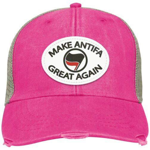A neon pink and tan distressed Adams trucker cap featuring a vegan leather patch with the text "Make Antifa Great Again" and an Antifa flag symbol.