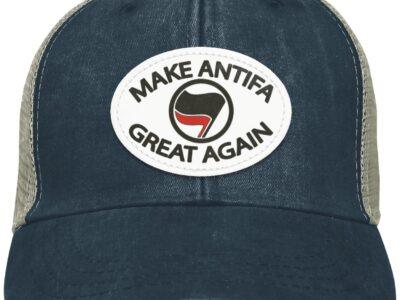 Make Antifa Great Again distressed Adams trucker cap. Navy blue with tan mesh back, featuring a vegan leather patch with political satire message