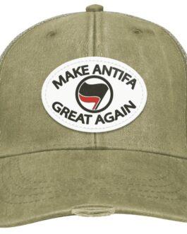 Distressed khaki "Make Antifa Great Again" hat. The Adams trucker cap features a vegan leather oval patch with the Antifa flag symbol. Anti-fascist apparel.