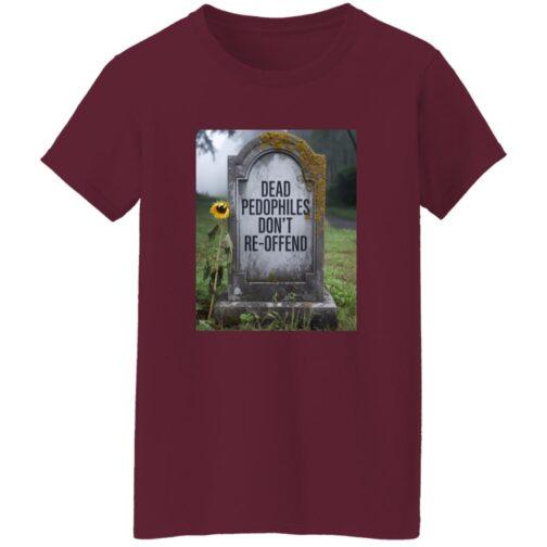 Maroon "Dead Pedophiles Don't Re-Offend" T-shirt featuring a tombstone graphic with the same text. A sunflower leans against the mossy stone in a misty cemetery setting.