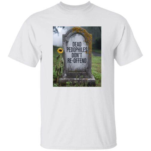 A white t-shirt displays an image of a tombstone with the text "Dead Pedophiles Don't Re-Offend" etched on it. A single sunflower leans against the stone in a somber graveyard setting. This political tee makes a statement.