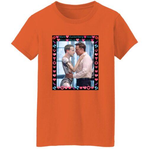 Orange women's Gildan G500L tee featuring AI-generated art of Elon Musk hugging ZuckBot, framed by hearts. A funny tech humor shirt for AI satire fans!