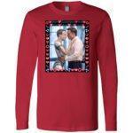 Red long sleeve tee featuring a framed image of Elon Musk hugging a Zuckerberg robot, captioned "Mark Zuckerberg And Elon Musk In Love," a funny AI satire shirt.