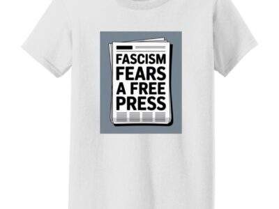 White women's classic-fit cotton tee with a newspaper graphic reading "Fascism Fears A Free Press." An anti-fascist First Amendment shirt for women.