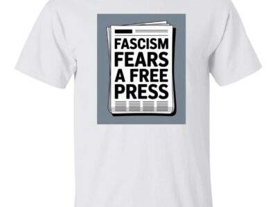 White heavy cotton graphic tee with a newspaper design reading "Fascism Fears A Free Press." An anti-fascist men's First Amendment shirt.